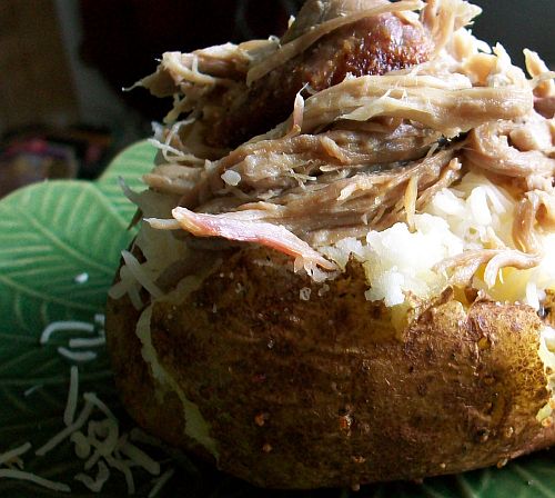 Piled on top of a hot, buttery baked potato!